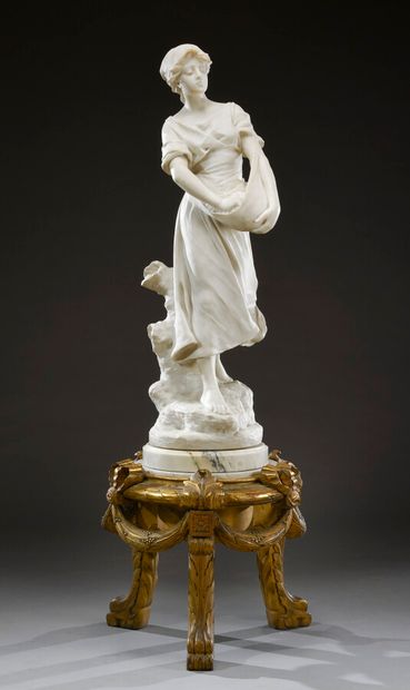 null E. Drouot (1859-1945), d'après, " La semeuse ", sculpture en marbre blanc

Socle...