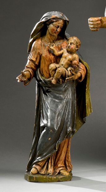 null Vierge à l'enfant en bois sculpté (noyer) et polychromé, représente la Vierge...