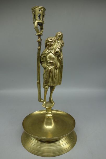FLAMBEAU en bronze doré à décor de Saint...
