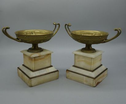 null Auguste Cain, according to... 
 Pair of antique gilt bronze cup-shaped cassolettes...