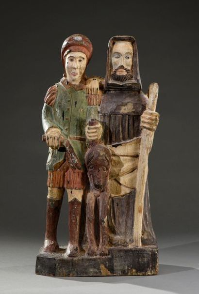 null Sculpture en bois polychromé représentant Saint Hubert accompagné d'un chasseur...