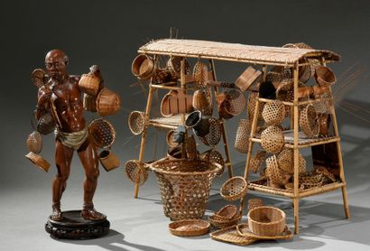 null Japan, Iki-ningyo, a lacquer sculpture depicts a wicker basket bearer wearing...