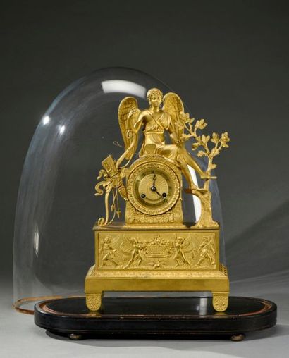 null Beautiful gilt bronze clock representing Eros, his bow and quiver of arrows...