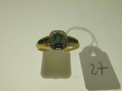 1 two-tone gold ring set with emeralds, hunchbacked...