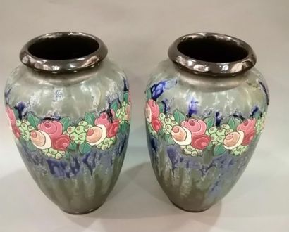 null KERAMIS.
Paire de vases en grès polychrome à décor d'une frise stylisée émaillée...