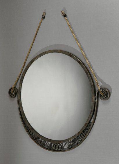 null Charles PIGUET (1887-1942)

Wall mirror with circular view in a grooved wrought...
