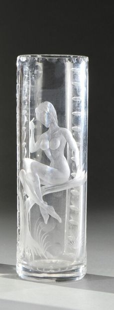 null MODERN WORK 

A white crystal tubular vase with cut decoration of a young woman...