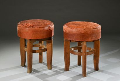 null Pair of oak stools, upholstered seats in red leather, attributed to Charles...