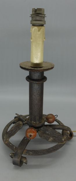 null FRENCH WORK 

Lamp stand with one light in hammered wrought iron decorated with...
