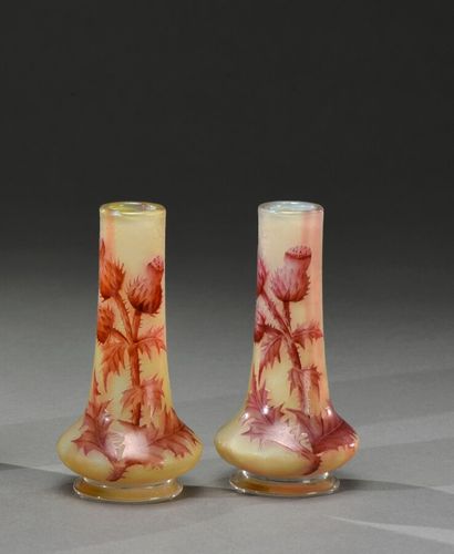null DAUM

Pair of vases with a flattened swollen base and a long tubular neck on...