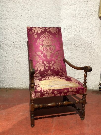 null High back armchair in moulded and carved walnut, leafy arms, turned base. 

Louis...