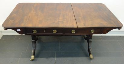 null England, mahogany flat desk, console legs with clogs and casters.

Late 19th...