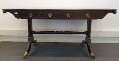 null England, mahogany flat desk, console legs with clogs and casters.

Late 19th...