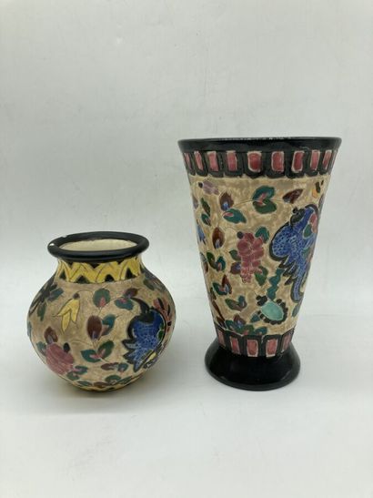 null J. MASSIER. Deux VASES en faïence à décor floral polychrome. Accidents. H. 19,5...