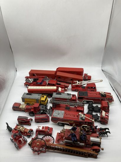 null Firemen, trucks, metal and plastic vehicles.

Lot of 23.

Various states.