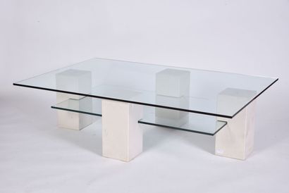 Coffee table with two glass tops resting...