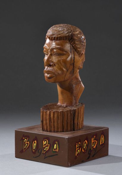 null SINIA (20th century).

Johnny Halliday, 1992.

Carved wood, direct cut.

Signed,...
