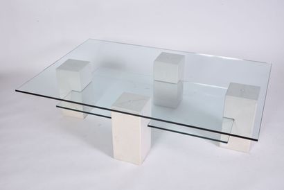 null Coffee table with two glass tops resting on four rectangular concrete legs....