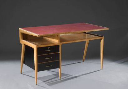 null Varnished beechwood desk with red laminated top and three drawers on the left...