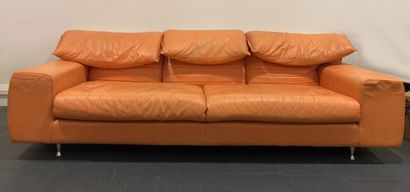 Three seater sofa in orange leather. 
H 72...