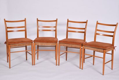 null Suite of 4 chairs in beech.

Scandinavian work.

Circa 1960.

H 86 cm - W 46...