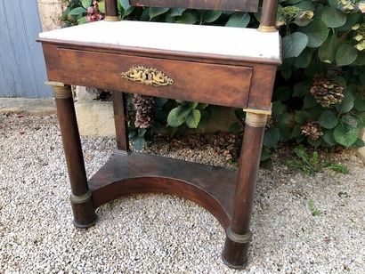 null A mahogany and mahogany veneer dressing table opening with a drawer in the waist,...