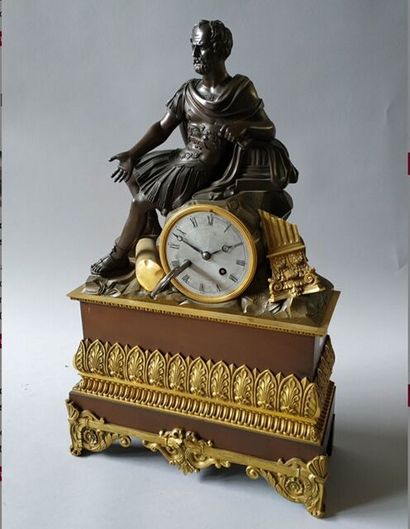 null A gilt bronze and patinated clock decorated with a roman emperor, hanging by...
