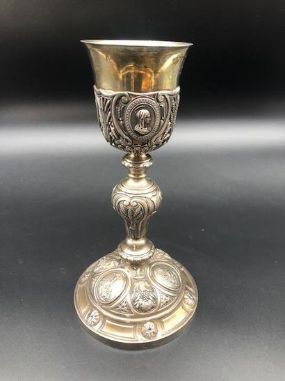 null Chalice in silver chased embossed with medallions depicting the Crucifixion,...
