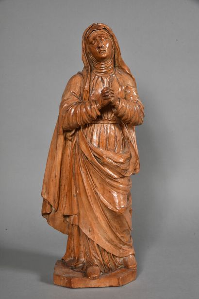 null Sainte femme aux mains jointes, en bois sculpté, anciennement polychromé.

XVIIIème...