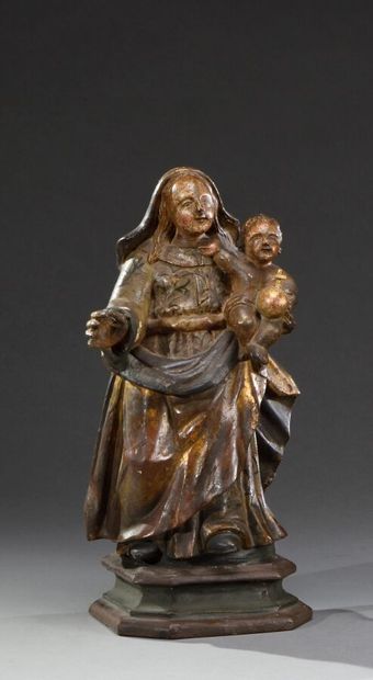 null Vierge à l'Enfant en bois sculpté, polychromé et doré.

Espagne. XVIIIème siècle....