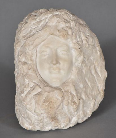 Sculpture en marbre, visage de femme sortant...