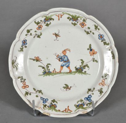 LYON. 
Plate with contoured edge in earthenware,...