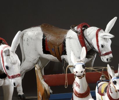 null Carousel donkey with articulated head, made of repolychromed wood, iron frame.

19th...