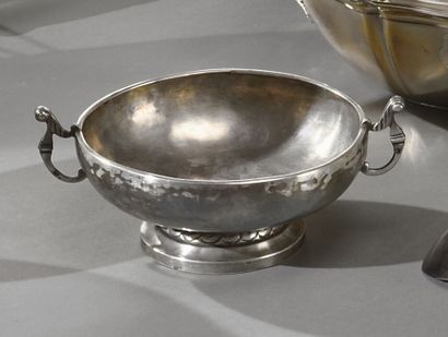 null Silver wedding cup on a pedestal decorated with oves, handles in leafy scroll.

Marked...
