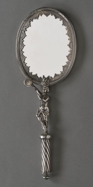 null Rare silver hand face, chased and engraved showing a young woman with a tambourine...