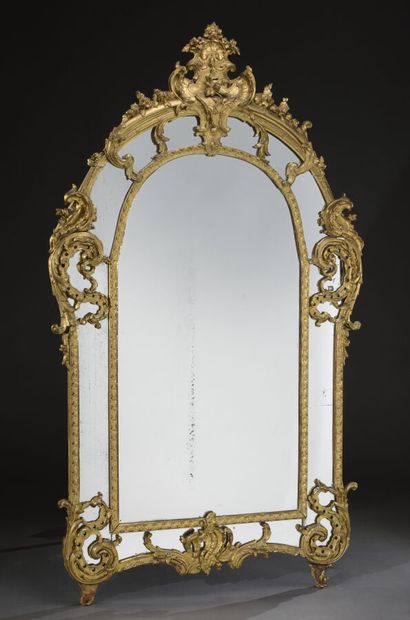 Grand miroir à parcloses en bois sculpté...