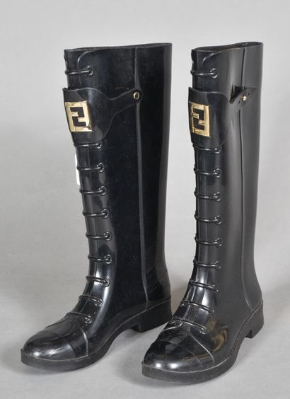 null FENDI. Pair of black plastic boots molded with a lace pattern under a signed...