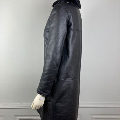 null SAINT LAURENT, by Anthony Vaccarello. Black shearling 7/8 coat, notched collar,...