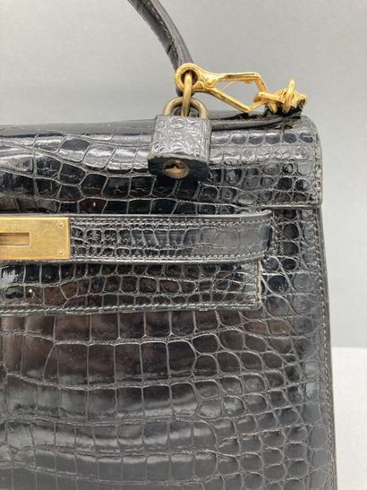 null HERMES PARIS, Circa 1958. 

Sac KELLY 28 cm en crocodile Porosus noir, attaches...