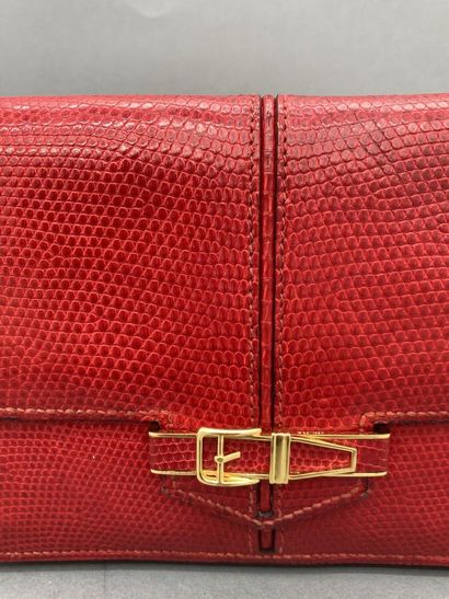 null HERMES Paris, made in France,

Pochette enveloppe en lézard rouge, fermoir en...