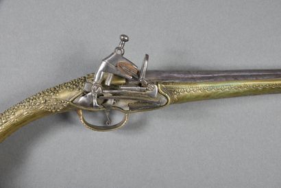 null Flintlock pistol, chenapan style lock, all brass decorated with foliage and...