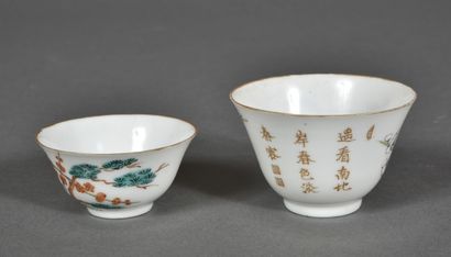 Two small porcelain alcohol cups with polychrome...