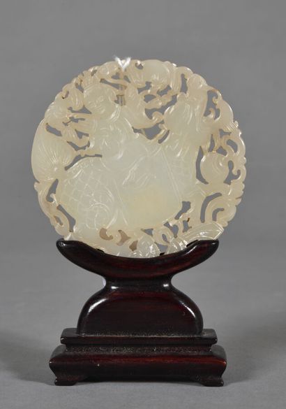 Large circular pendant in white celadon jade,...