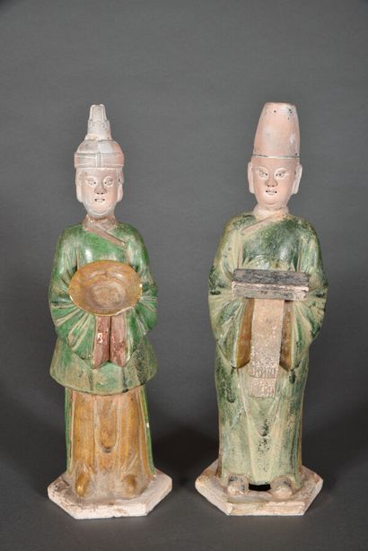 Couple of offering bearers in green and ochre...