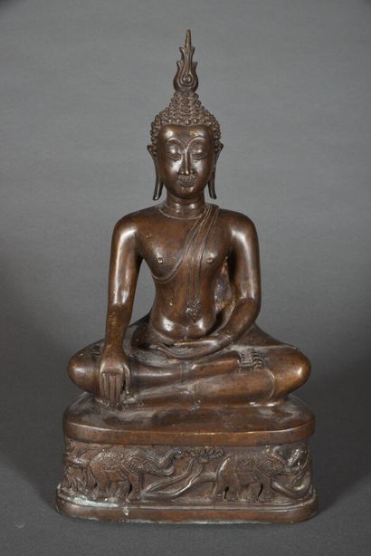 Buddha in bronze with brown patina, seated...