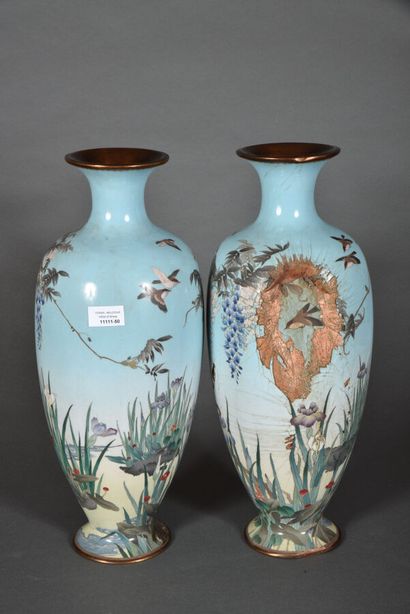 null Pair of large enamelled copper vases, with polychrome decoration on a sky blue...