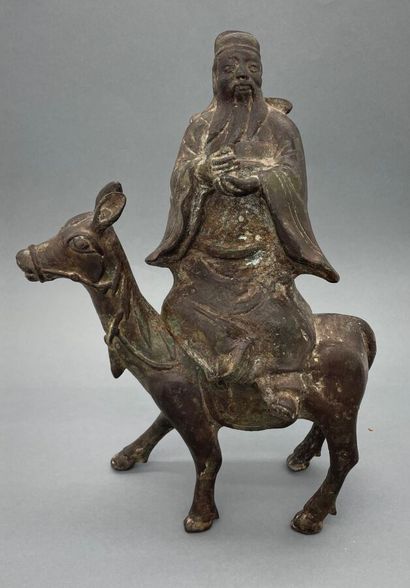 Sujet en bronze représentant Laozi sur sa...