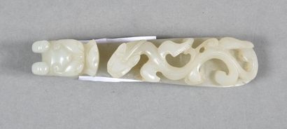 null White-celadonated jade fibula, the hook in the shape of a dragon's head, the...