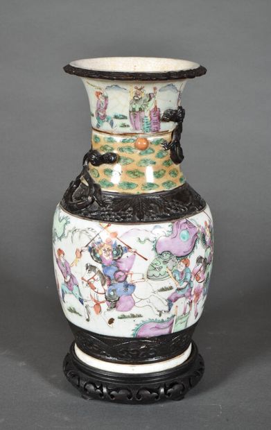 null Stoneware baluster vase, the body decorated with a rider in famille rose enamels,...