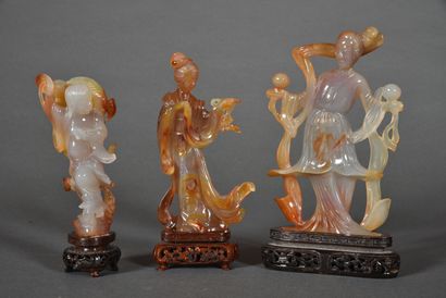 Three carnelian or agate-carnelian statuettes,...